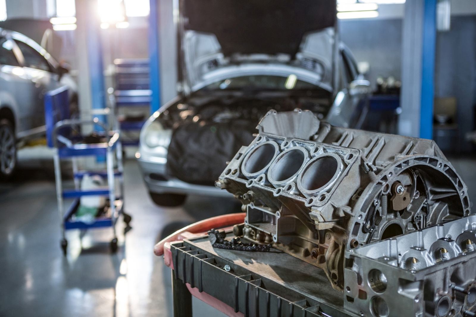 Close-up of car parts in repair garage